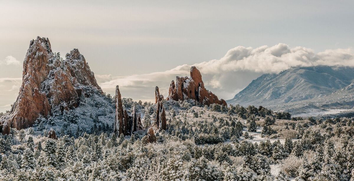 Garden of the Gods red rock formations with Pikes Peak behind Colorado Springs