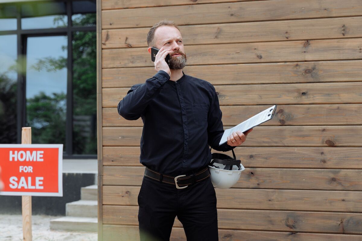 Denver real estate agent working with a client